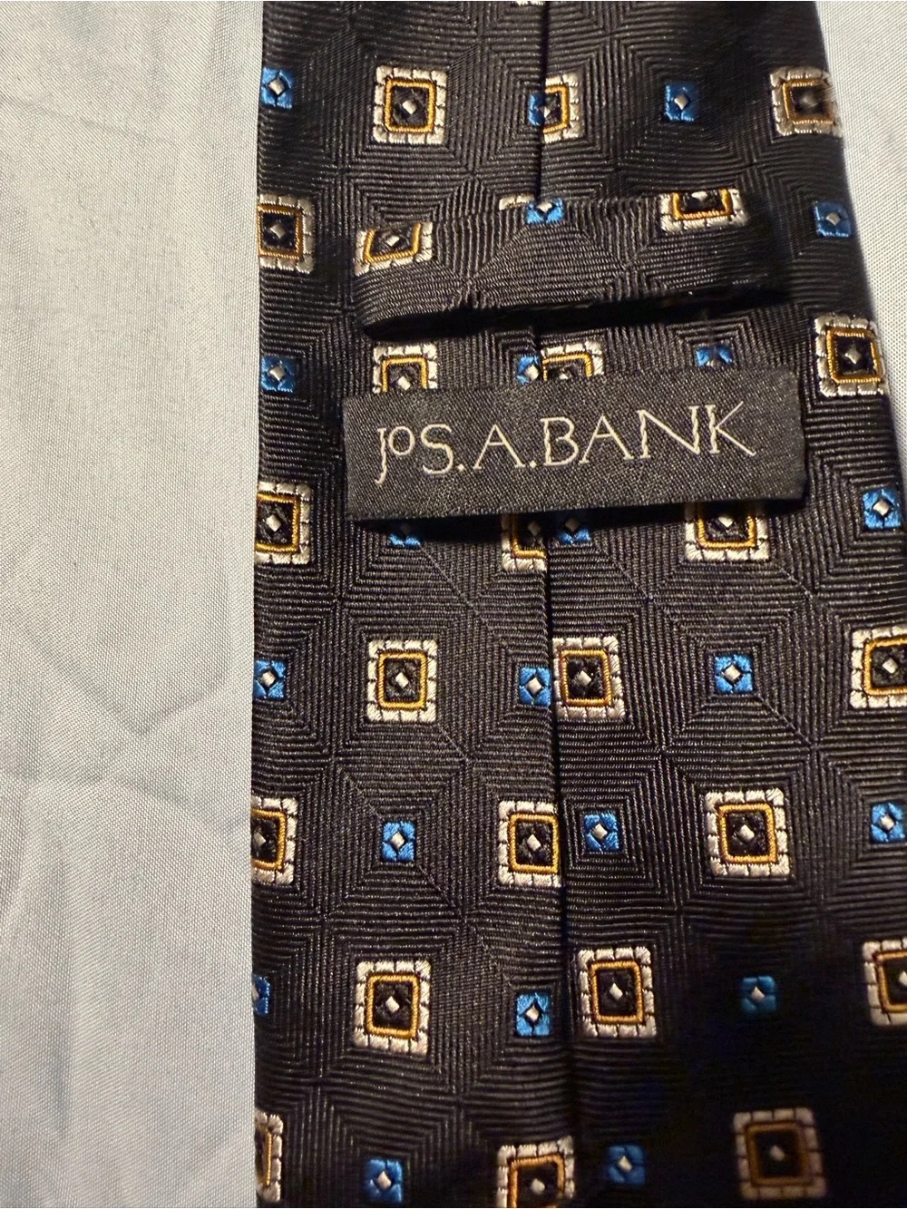 Jos. A. Bank Black Tie with Blue and Gold Geometric Squares